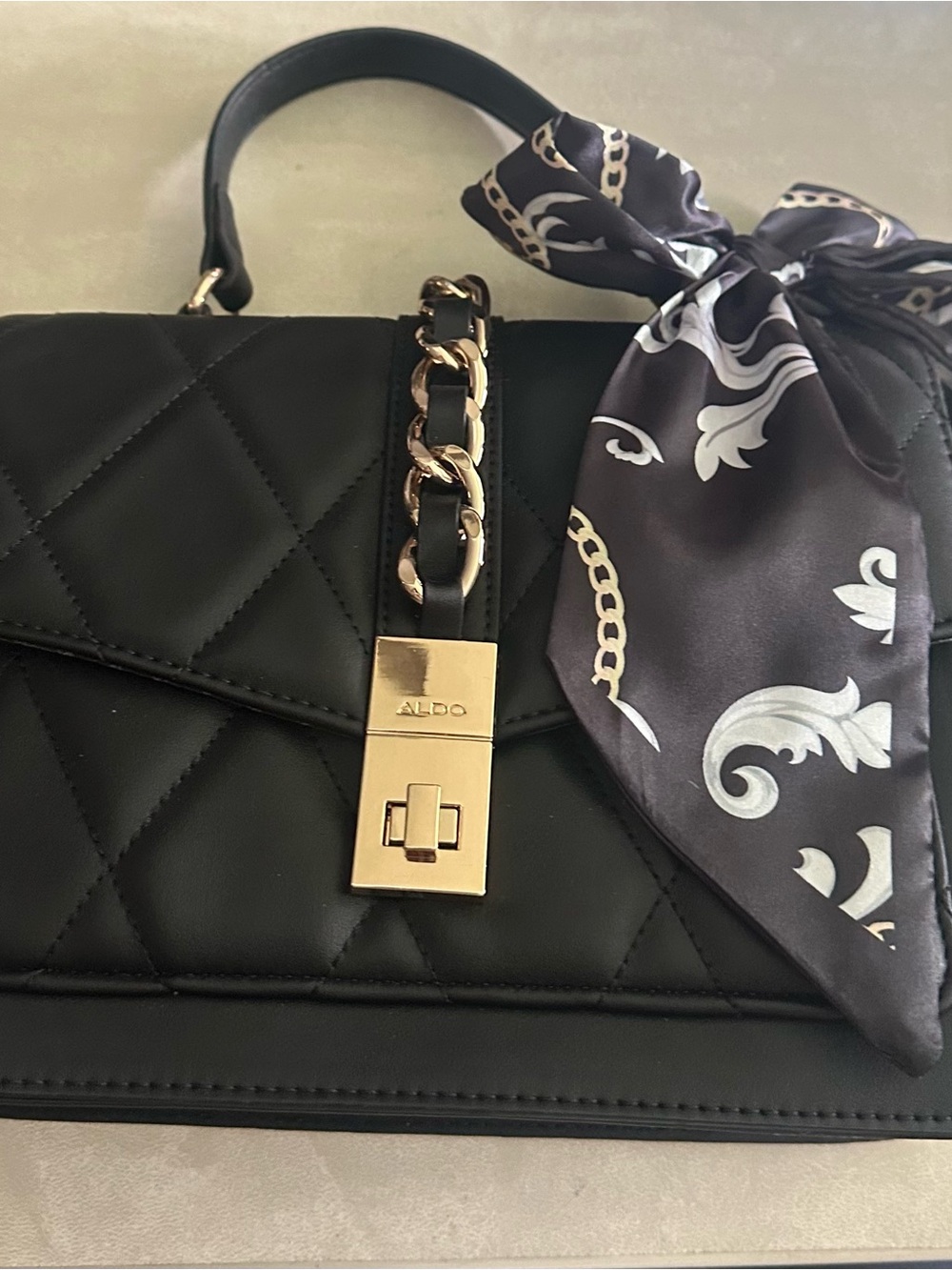ALDO Black Quilted Satchel with Gold Chain and Scarf Accent